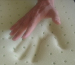 green-memory-foam-hand-250pix